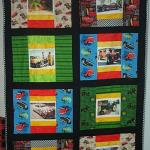 Darlene Yetter - I have attached a photo of the quilt I made for my Brother.  I named it: "Old Friends" The pictures are of his Antique and Classic Cars and Tractors, some of which he lost in the 2003 San Diego Fires along with his home.